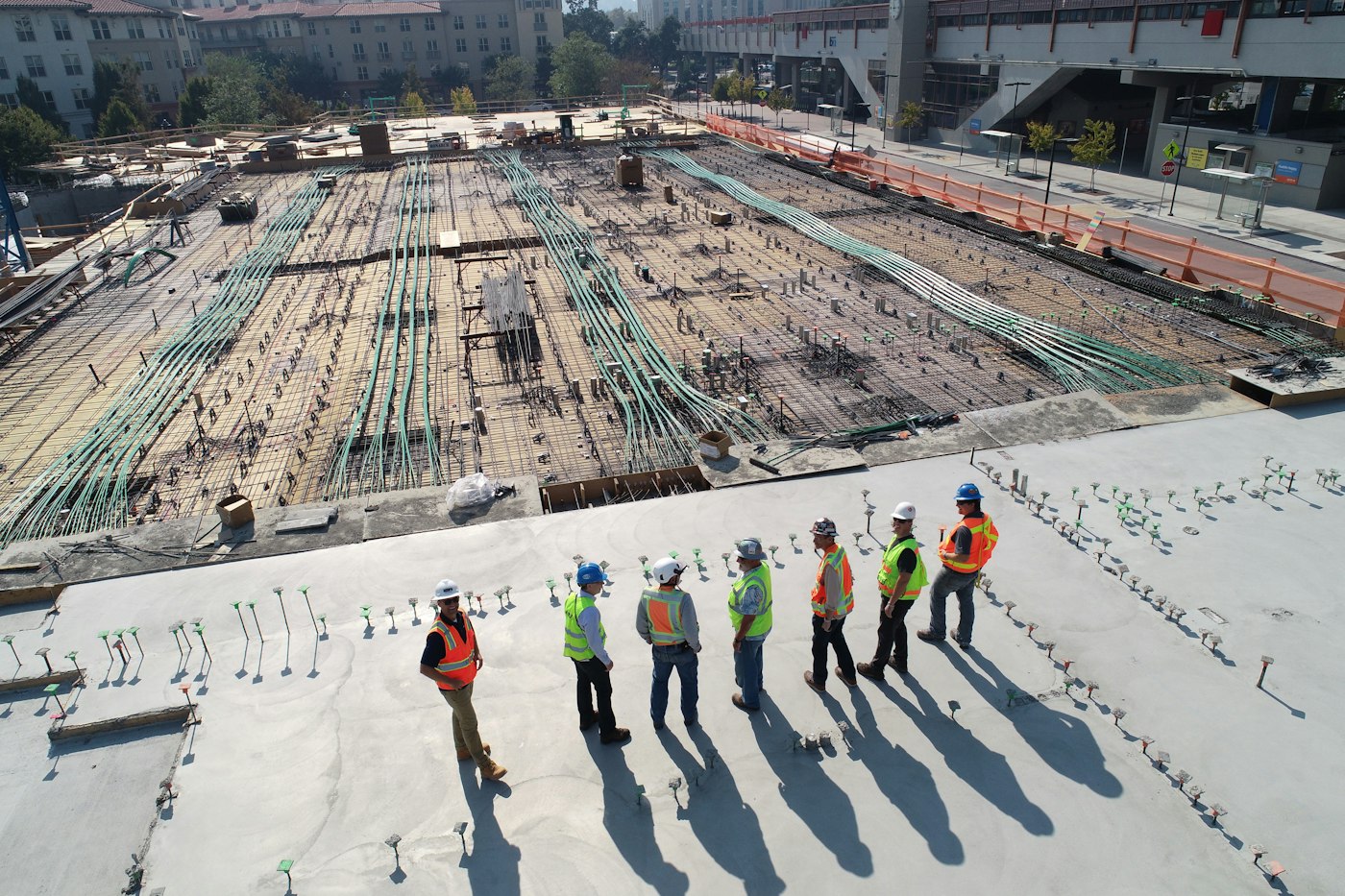 Technicians in safety gear on site